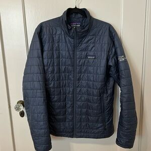 Men’s size Medium Patagonia with the Orville logo on right arm